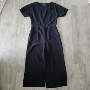 RW&CO Crop Leg Classic Black Jumpsuit With Draped Cut Out Back